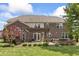 Brick backyard featuring a pergola-covered patio with outdoor seating, ideal for entertaining or relaxation at 10504 Ruxton Ct, Fishers, IN 46040