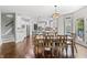 Open concept dining area leading into a bright, modern kitchen with lots of light at 10504 Ruxton Ct, Fishers, IN 46040