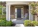 Charming front porch with a rocking chair, offering a warm welcome to this beautiful home at 10504 Ruxton Ct, Fishers, IN 46040