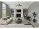 Bright living room with a fireplace, built-in shelving, and modern furnishings for a comfortable living space at 10504 Ruxton Ct, Fishers, IN 46040