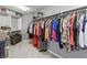 Spacious walk-in closet featuring ample hanging storage and shelving for optimal organization at 10504 Ruxton Ct, Fishers, IN 46040
