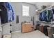 Functional walk-in closet with built-in shelving, dresser, and room for organizing personal belongings at 10504 Ruxton Ct, Fishers, IN 46040