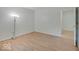 This bright bedroom has laminate floors and modern lighting at 1098 Timber Creek Dr # 2, Carmel, IN 46032