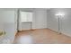 This bedroom features beautiful wood laminate floors and a large window at 1098 Timber Creek Dr # 2, Carmel, IN 46032