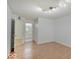 This spacious bedroom features wood floors and an en-suite bathroom at 1098 Timber Creek Dr # 2, Carmel, IN 46032