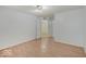 A bright room with wood floors and multiple doors to other areas at 1098 Timber Creek Dr # 2, Carmel, IN 46032