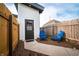 Private backyard area with blue Adirondack chairs at 1112 Spann Ave, Indianapolis, IN 46203