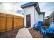 Private backyard area with blue Adirondack chairs at 1112 Spann Ave, Indianapolis, IN 46203