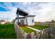 Striking modern home features a stylish covered porch and well-manicured lawn at 1112 Spann Ave, Indianapolis, IN 46203