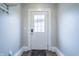 Front door of the house with glass windows and a digital lock, offering both security and natural light at 1112 Spann Ave, Indianapolis, IN 46203