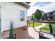 Cozy front porch with stylish seating and a 'Home Sweet Home' welcome mat at 1112 Spann Ave, Indianapolis, IN 46203