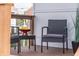 Close-up of stylish front porch with outdoor seating and elegant decor at 1112 Spann Ave, Indianapolis, IN 46203