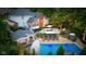 An amazing backyard featuring a pool, patio, pergola and outdoor kitchen, perfect for relaxing and entertaining at 11245 Old Stone Dr, Indianapolis, IN 46236