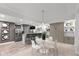 Stylish bar area features seating, a Murphy bed, modern appliances, and sleek design for entertaining and relaxation at 11245 Old Stone Dr, Indianapolis, IN 46236