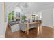 Bright living room featuring vaulted ceilings, a cozy fireplace, and elegant furnishings for relaxation at 11245 Old Stone Dr, Indianapolis, IN 46236