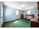 Serene bedroom with natural light, ample space, and hardwood furnishings, offering a peaceful retreat at 11600 N 100 E, Morristown, IN 46161