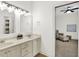 Bathroom featuring a double vanity sink and neutral wall color, adding comfort at 12152 Teal Ln, Carmel, IN 46032