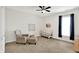 Bedroom with neutral walls, chair, and crib, offering comfort and style at 12152 Teal Ln, Carmel, IN 46032