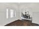 Foyer with white trimmed door and arched doorway leading to the dining room at 12152 Teal Ln, Carmel, IN 46032