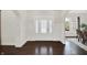 Bright foyer with decorative glass door and view to the dining room at 12152 Teal Ln, Carmel, IN 46032