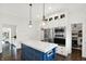 Bright kitchen featuring a large island, stainless steel appliances, and plenty of storage at 12152 Teal Ln, Carmel, IN 46032