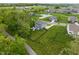 Picturesque aerial view of a home, pond, and surrounding community at 12811 Corydon Dr, Fishers, IN 46037