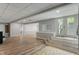 Spacious finished basement featuring wood floors and access to the yard at 12811 Corydon Dr, Fishers, IN 46037