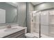 Bathroom with a modern vanity, a walk-in shower, and neutral tones, creating a clean and refreshing space at 12811 Corydon Dr, Fishers, IN 46037