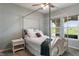 Serene bedroom featuring a four-poster bed, soft lighting, and a calming color palette, perfect for relaxation at 12811 Corydon Dr, Fishers, IN 46037