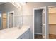 Bathroom featuring modern vanity with plenty of storage and walk-in closet at 1283 Easton Point Dr, Greenwood, IN 46142