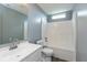 Bathroom featuring a modern white vanity, large mirror, and shower-tub combination at 1283 Easton Point Dr, Greenwood, IN 46142