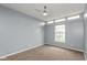 Neutral bedroom with plush carpet, ceiling fan, and lots of natural light at 1283 Easton Point Dr, Greenwood, IN 46142