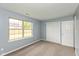 Bedroom with neutral carpet, built-in closet, and lots of natural light at 1283 Easton Point Dr, Greenwood, IN 46142