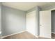 Bedroom showcasing closet with sliding doors and neutral walls and carpet at 1283 Easton Point Dr, Greenwood, IN 46142
