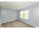 Bright bedroom with neutral carpet and plenty of natural light at 1283 Easton Point Dr, Greenwood, IN 46142