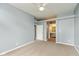 Main bedroom with attached bathroom and neutral tones at 1283 Easton Point Dr, Greenwood, IN 46142
