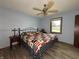 Inviting bedroom with a ceiling fan and a bright window that fills the space with natural light at 1513 Ashley Dr, Lebanon, IN 46052