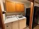 Practical laundry area with modern washer/dryer and convenient built-in cabinetry at 1513 Ashley Dr, Lebanon, IN 46052