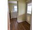 Bathroom featuring a walk-in bathtub with an outward-swinging door at 1618 California St, Columbus, IN 47201