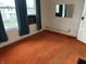 Bedroom with carpet, natural light, and a wall-mounted mirror at 1618 California St, Columbus, IN 47201