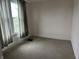 Bedroom with a window and carpet at 1618 California St, Columbus, IN 47201