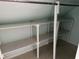Closet with ample shelving, overhead storage and hanging rod at 1618 California St, Columbus, IN 47201