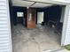 Organized garage space presents possibilities for storage and hobbies at 1618 California St, Columbus, IN 47201