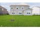 Spacious backyard with a well-maintained lawn and black metal fencing at 17951 Paula Walk, Westfield, IN 46074