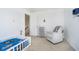 Bedroom featuring a comfortable chair and playful cartoon decals at 17951 Paula Walk, Westfield, IN 46074