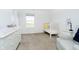 Bright Bedroom with white furniture including crib, changing table, and comfortable chair at 17951 Paula Walk, Westfield, IN 46074