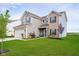 Beautiful two-story home featuring a spacious lawn, a two-car garage, and a welcoming front entrance at 17951 Paula Walk, Westfield, IN 46074