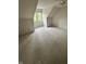 Finished attic featuring neutral carpet, skylight and sloped ceilings at 1915 Seaport Dr, Indianapolis, IN 46240