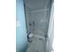Bathroom featuring an accessible walk-in shower and a toilet at 1915 Seaport Dr, Indianapolis, IN 46240