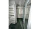 Spacious walk-in closet offering ample storage with built-in shelving and mirrored doors at 1915 Seaport Dr, Indianapolis, IN 46240